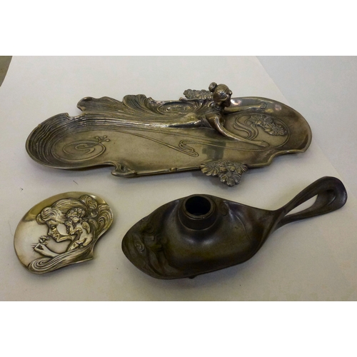 255 - Art Nouveau design pewter metalware, viz. a tray, decorated with a woman swimming&nbsp; 14.5