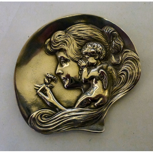 255 - Art Nouveau design pewter metalware, viz. a tray, decorated with a woman swimming&nbsp; 14.5