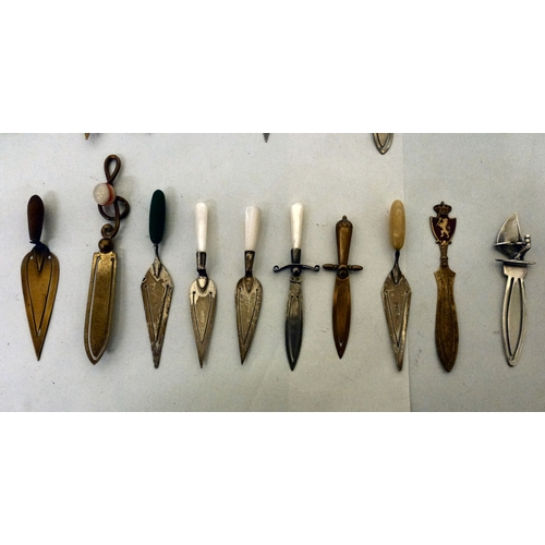 258 - A mixed lot: to include a silver bookmark, surmounted by an owl&nbsp;