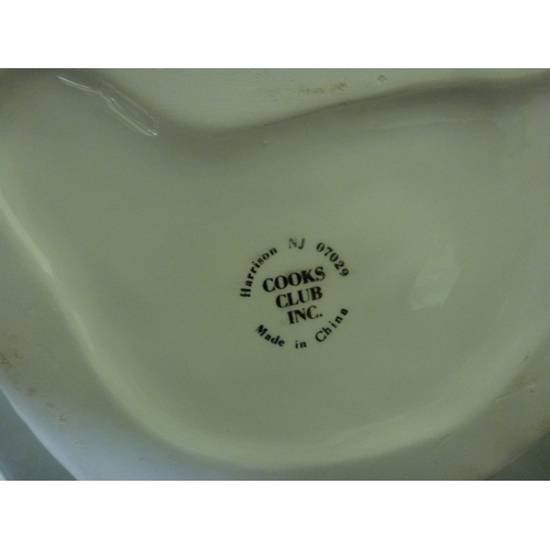 262 - A novelty china lidded cookie jar, fashioned as a snowman; and two mugs