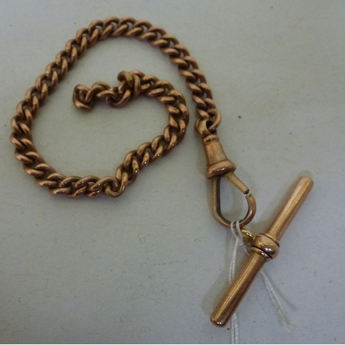 268 - A section of a 9ct gold curb link watchchain and a yellow metal T-bar (approx. combined gross weight... 