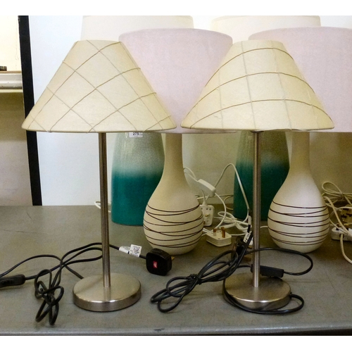 275 - Modern interior lamps: to include a pair of two-tone crackle glazed examples  each 16