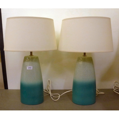 275 - Modern interior lamps: to include a pair of two-tone crackle glazed examples  each 16