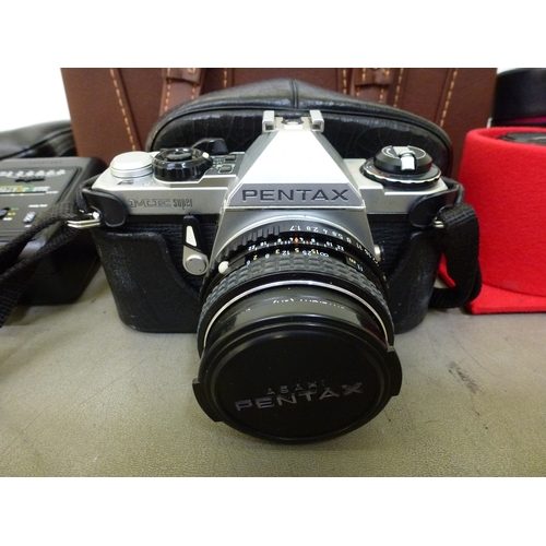 279 - An Asahi Pentax ME Super camera with carry case and accessories