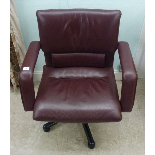 28 - WITHDRAWN   A Vitra Bellini Collection design rotating office chair, upholstered in red hide