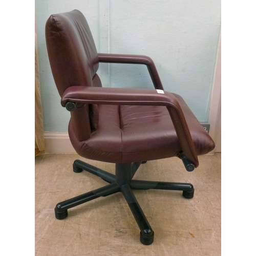 28 - WITHDRAWN   A Vitra Bellini Collection design rotating office chair, upholstered in red hide