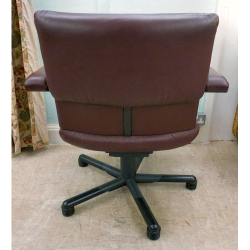 28 - WITHDRAWN   A Vitra Bellini Collection design rotating office chair, upholstered in red hide