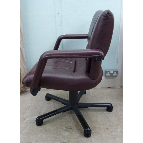 28 - WITHDRAWN   A Vitra Bellini Collection design rotating office chair, upholstered in red hide