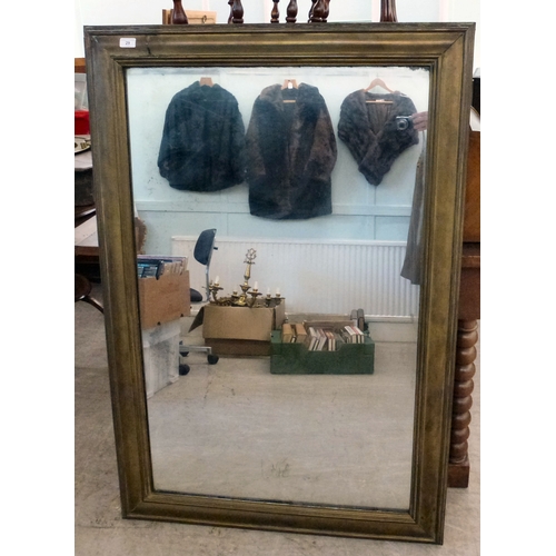 29 - A late 19thC mirror, the plate set in a bronze plated frame  52