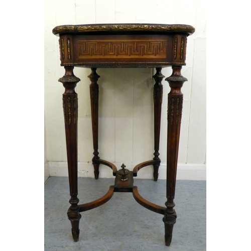 293 - An early 20thC French style marquetry and string inlaid mahogany writing table, the hinged lid profu... 