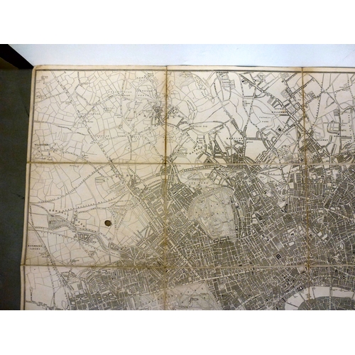 39 - Map, from the personal library of Tim Gosling: a folded linen backed example 'London Guide to The In... 