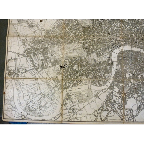 39 - Map, from the personal library of Tim Gosling: a folded linen backed example 'London Guide to The In... 