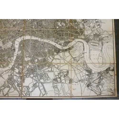 39 - Map, from the personal library of Tim Gosling: a folded linen backed example 'London Guide to The In... 
