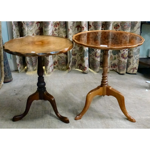 46 - Two similar walnut finished pedestal tables, each raised on a tripod base&nbsp; 22