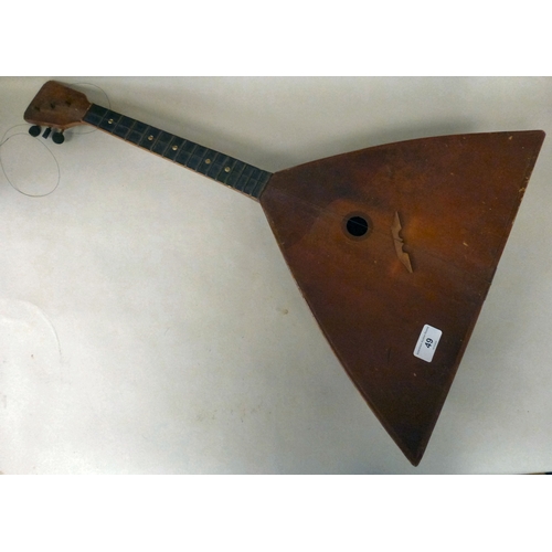 49 - A Russian wooden balalaika of triangular form