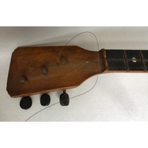 49 - A Russian wooden balalaika of triangular form