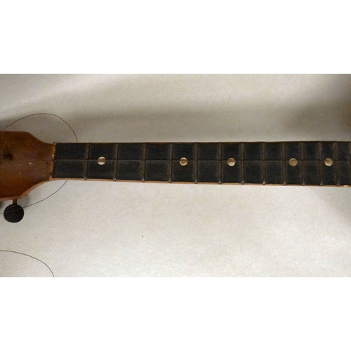 49 - A Russian wooden balalaika of triangular form