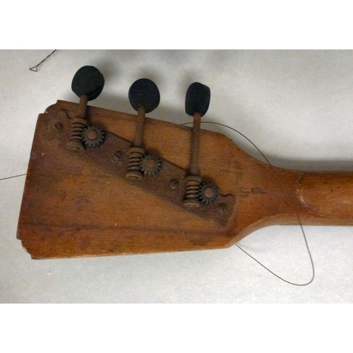 49 - A Russian wooden balalaika of triangular form