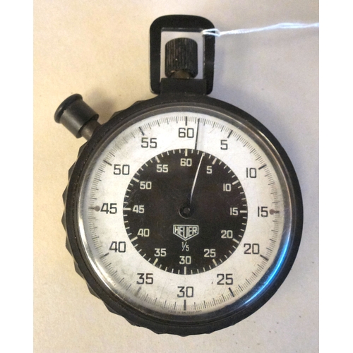 54 - A Heuer black plastic cased stop watch