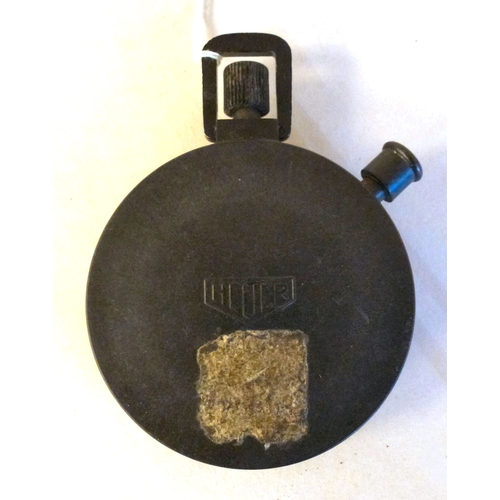 54 - A Heuer black plastic cased stop watch