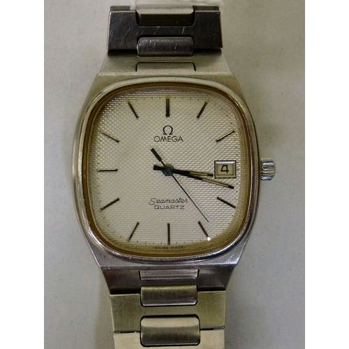 7 - An Omega Seamaster stainless steel cased and strapped wristwatch with a quartz movement, faced by a ... 