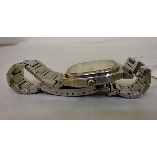7 - An Omega Seamaster stainless steel cased and strapped wristwatch with a quartz movement, faced by a ... 