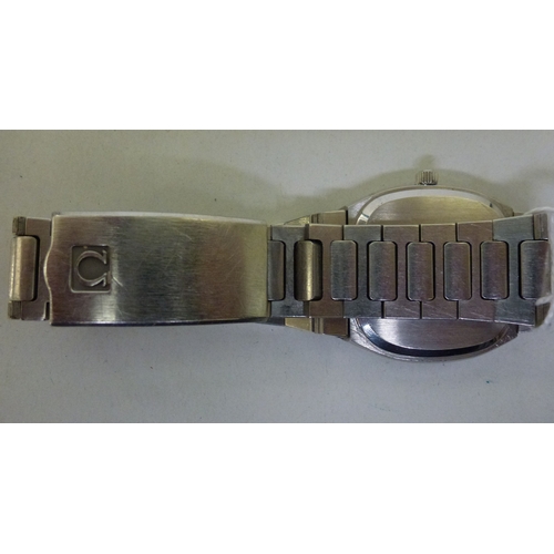 7 - An Omega Seamaster stainless steel cased and strapped wristwatch with a quartz movement, faced by a ... 