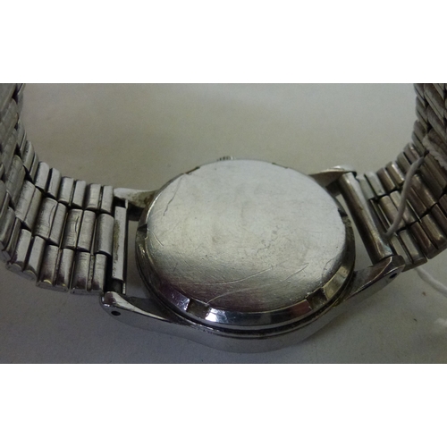 8 - A 1950s/60s Omega stainless steel cased and strapped wristwatch, faced by an Arabic and baton dial w... 