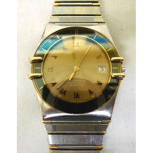 9 - An Omega Constellation stainless steel and gold plated cased and strapped wristwatch, the quartz mov... 