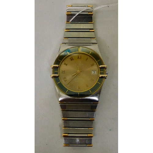 9 - An Omega Constellation stainless steel and gold plated cased and strapped wristwatch, the quartz mov... 