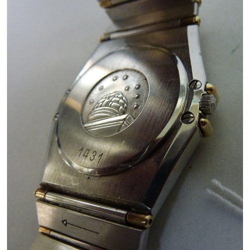 9 - An Omega Constellation stainless steel and gold plated cased and strapped wristwatch, the quartz mov... 