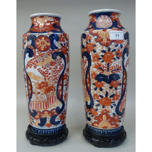 11 - A pair of Japanese Imari vases, decorated with flora&nbsp; each 13