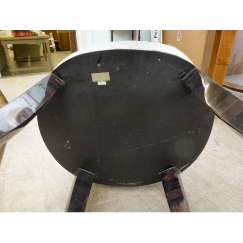 16 - A pair of modern brass inlaid, faux tortoiseshell veneered chairs, the backs of shell design, uphols... 