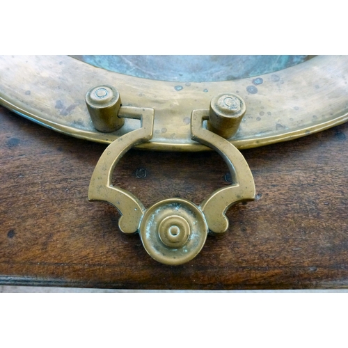 17 - A mid 19thC brazier table, the brass bowl with two handles and an oak frame with canted corners and ... 