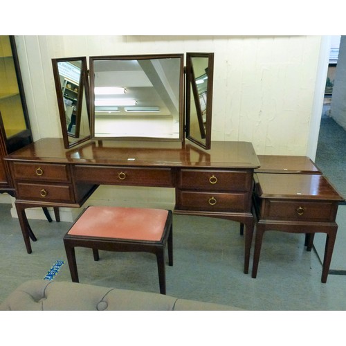 300 - A Stag mahogany dressing table with a raised, mirrored back, over five drawers, raised on square leg... 