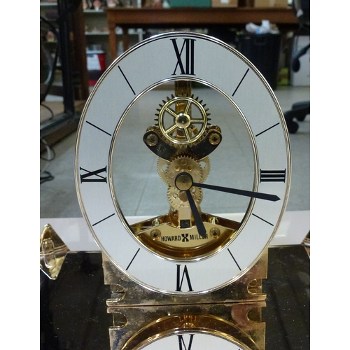 Clocks: to include a Howard Miller perspex pyramid design example ...