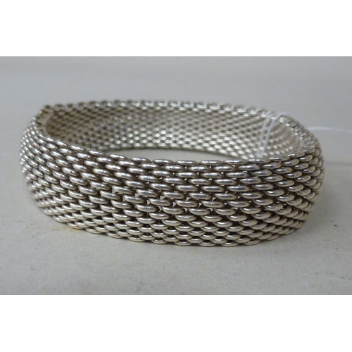 109 - A Tiffany & Co 925 silver mesh design fixed bracelet&nbsp; boxed&nbsp;