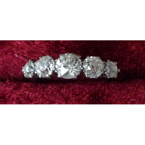 10 - WITHDRAWN  A white metal five stone diamond ring