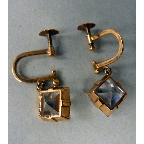 14 - A pair of 18ct gold earrings, each set with white stones