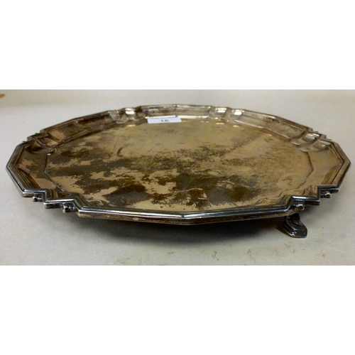 16 - A silver salver with a cast border and pad feet&nbsp; Birmingham 1955&nbsp; 10