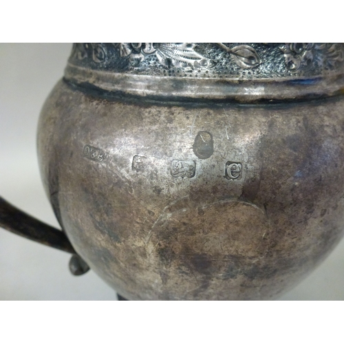 21 - WITHDRAWN A white metal jug of sparrow beak design  7.5