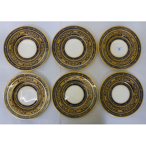 29 - A set of six Minton's china plates produced for T.Goode & Co, decorated in blue with gilt highli... 