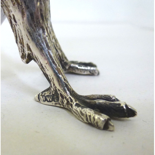 30 - A late Victorian whisky decanter, fashioned as a parrot with a silver collar, head and legs  Henry W... 