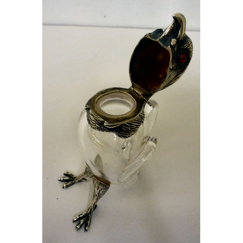 30 - A late Victorian whisky decanter, fashioned as a parrot with a silver collar, head and legs  Henry W... 