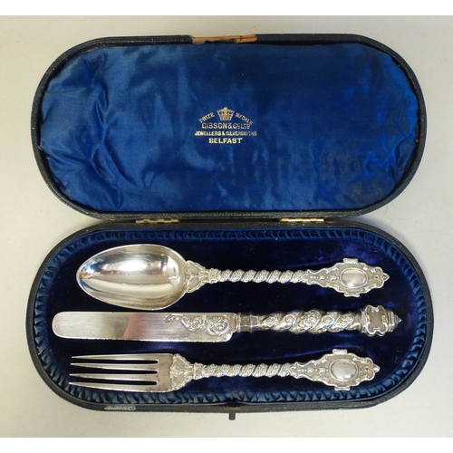 50 - A late Victorian silver three piece Christening set, comprising a spoon, knife and fork  London 1866... 