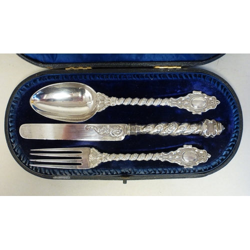 50 - A late Victorian silver three piece Christening set, comprising a spoon, knife and fork  London 1866... 