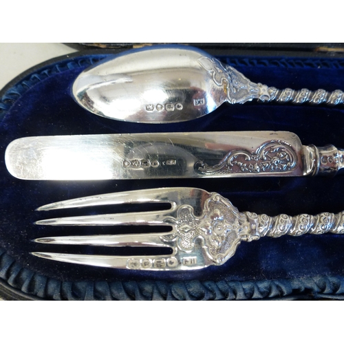50 - A late Victorian silver three piece Christening set, comprising a spoon, knife and fork  London 1866... 