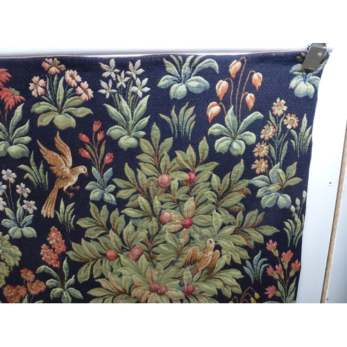 55 - HAL - a 20thC Flemish inspired tapestry hanging, depicting figures in period costume, in a woodland ... 