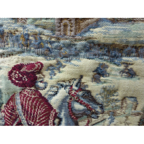 57 - A 20thC Flemish inspired tapestry hanging, depicting an inner city landscape from a woodland hillsid... 