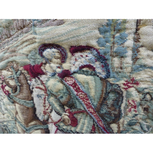 57 - A 20thC Flemish inspired tapestry hanging, depicting an inner city landscape from a woodland hillsid... 